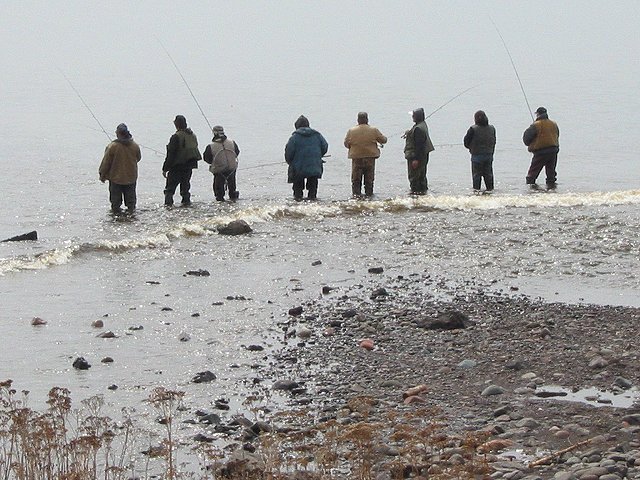 Fishermen at mouth of the French River at Lake Superior, Duluth, Minnesota