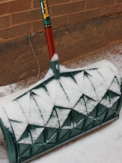 Shovel during snowstorm, Fairfax, Virginia