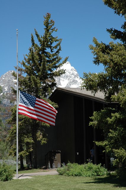 Half-mast flag outside vistor center at Moose, Grand Teton National Park, Wyoming